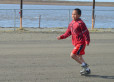 The boy in red.
